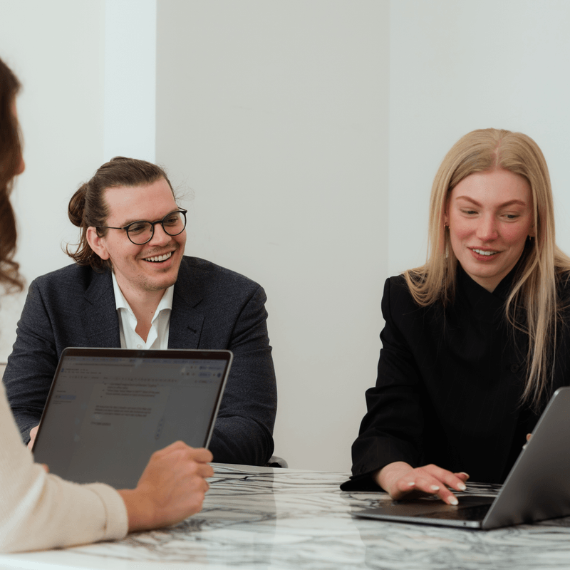 Team collaborating around a meeting table