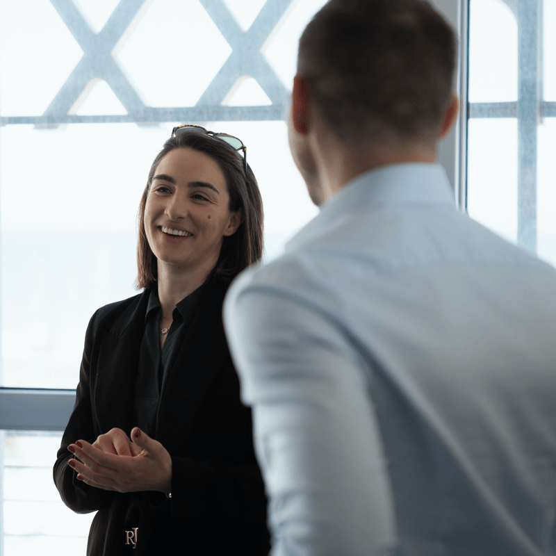 Two colleagues in conversation